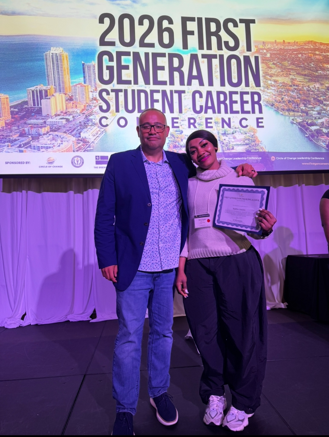 Maria Coates receiving her First Generation certificate at the 2026 conference